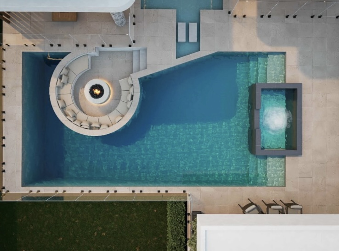 Aerial view of a luxury pool with integrated circular fire lounge and spa
