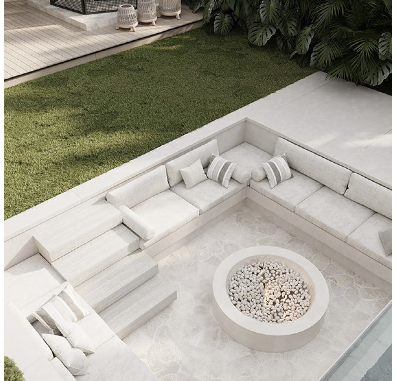 Sunken outdoor lounge with built-in seating, steps and central fire pit